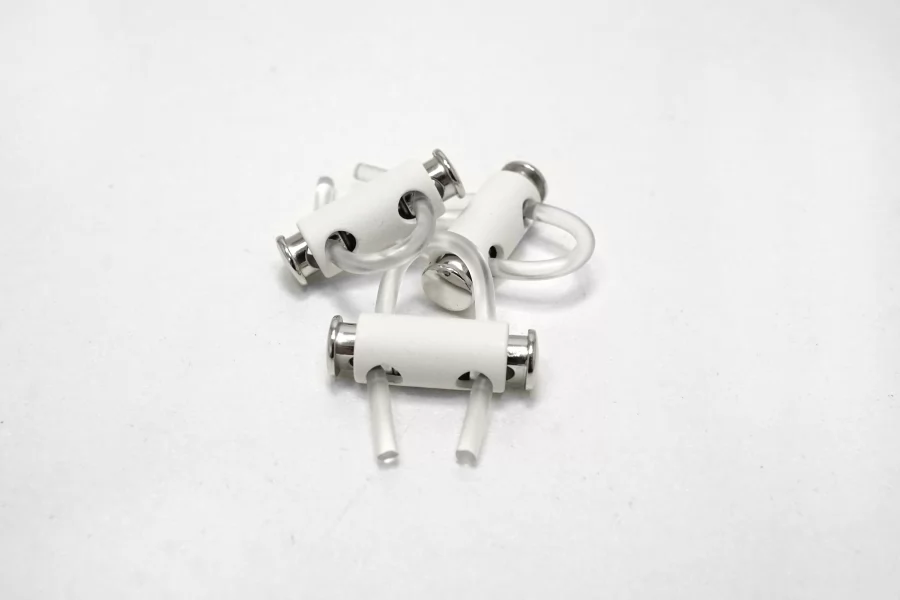 Фиксатор для шнурка металл белый  (Z2) 17112510