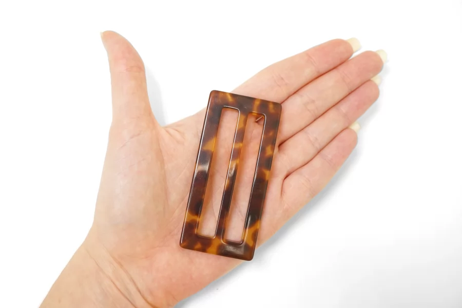 Пряжка пластик коричневая 35х75 мм (T2)  25112506