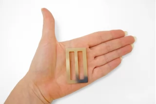 Пряжка пластик бежевая под рог 30х50 мм (YY-2) 25112518