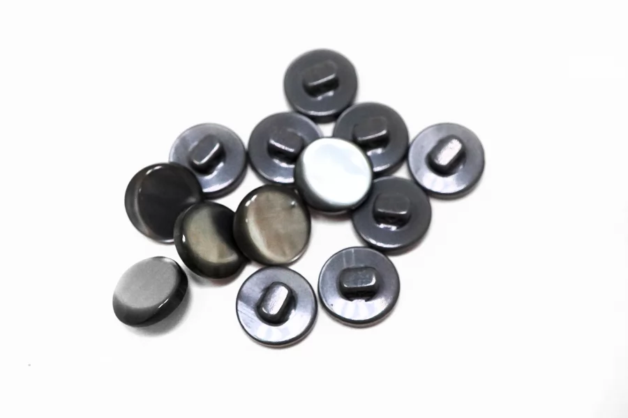 Пуговица пластиковая на ножке  Серая 12мм  ( J-3)  27112555