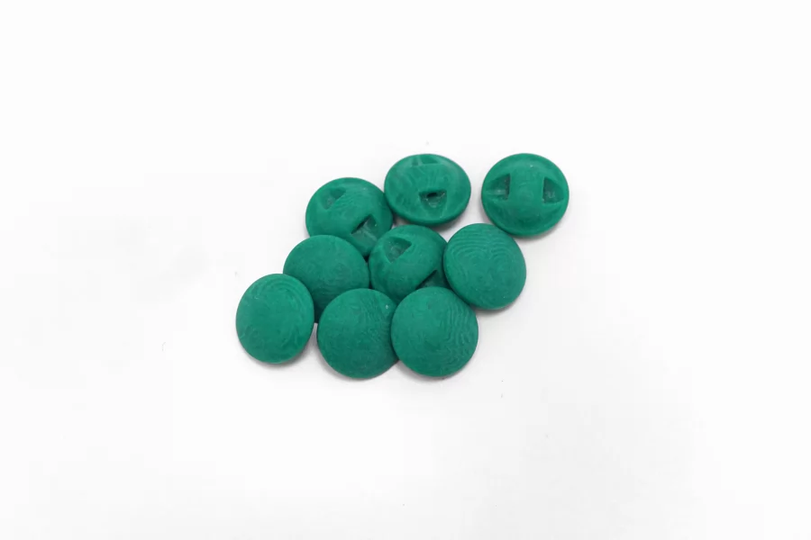 Пуговица пластиковая на ножке  Зеленая 11 мм  ( J-3)  27112584