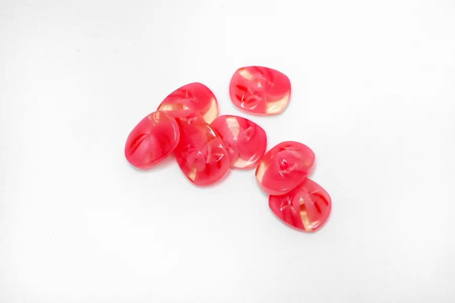 Пуговица пластиковая на ножке розовая  15 мм  (S-3)  12022615