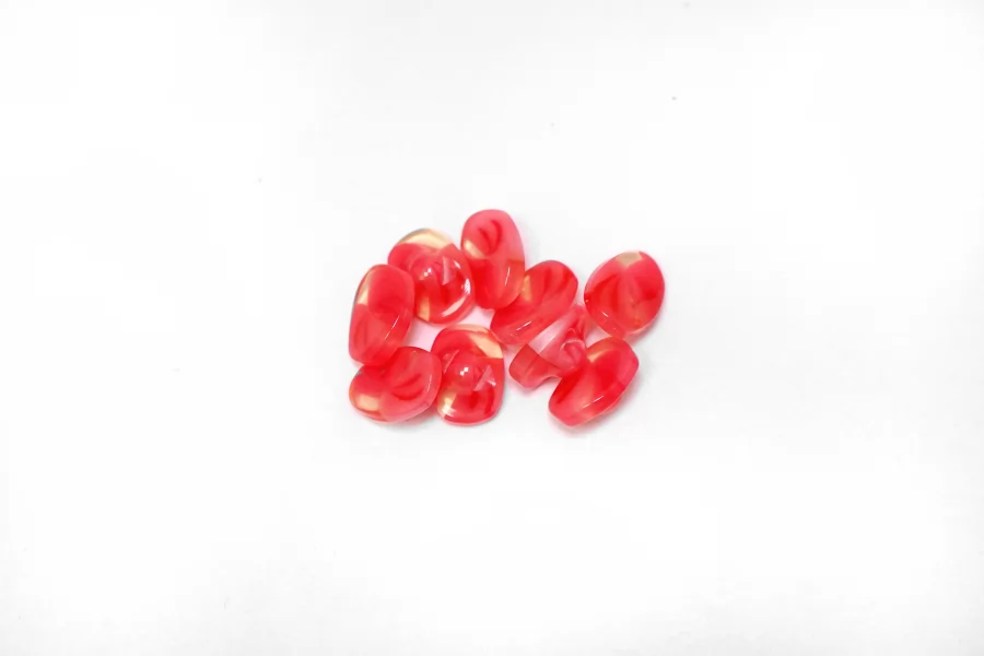 Пуговица пластиковая на ножке розовая  12 мм  (S-3)  12022616