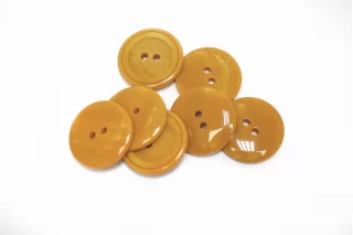 Пуговица костюмно-плательная пластик 18 мм желтая (P-3) 16112530